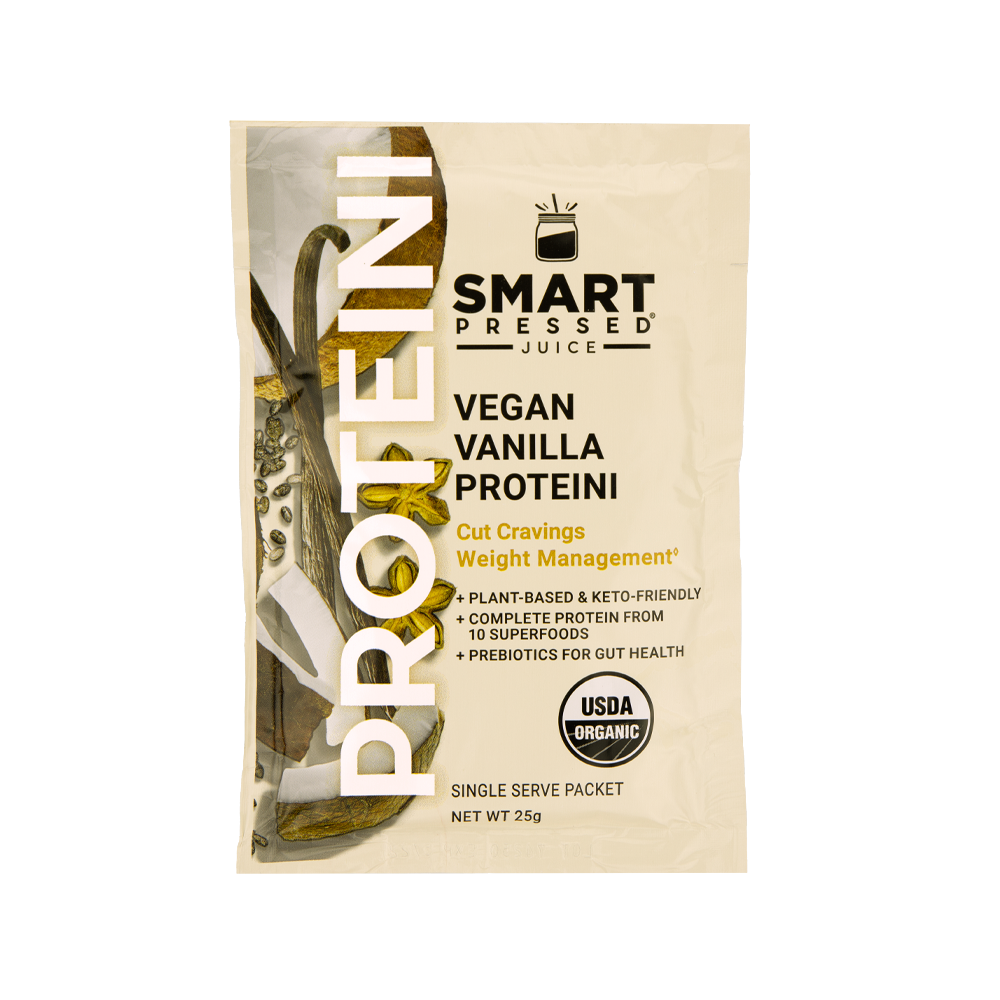 A beige colored sachet of Smart Pressed Juice Vegan Vanilla Proteini, which has cover art containing vanilla bean and star-shaped pod, reading Vegan Vanilla Proteini, Cut Cravings Weight Management, Plant-based & Keto Friendly, Complete Protein from 10 Superfoods, Prebiotics for gut health, single serving packet, 25 grams. Contains the USDA certified organic logo