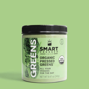 1 jar of 240 grams Organic Pressed Greens against a light green background.